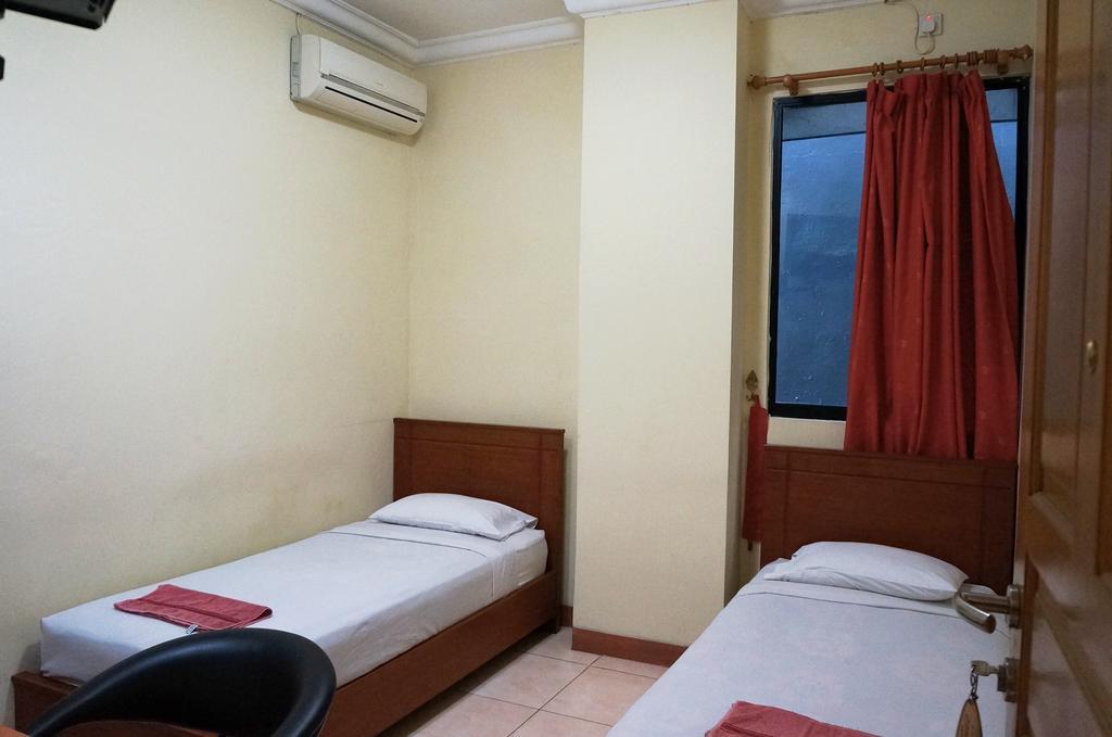 Jesnic Hotel Padang  Zimmer foto